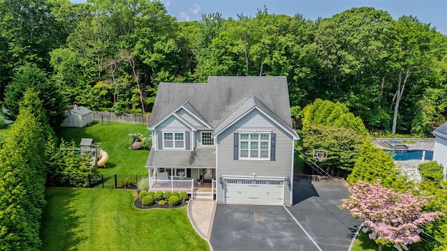 7 Long View Dr, Wading River, NY 11792 - view of front facade featuring a porch, asphalt driveway, and an attached garage