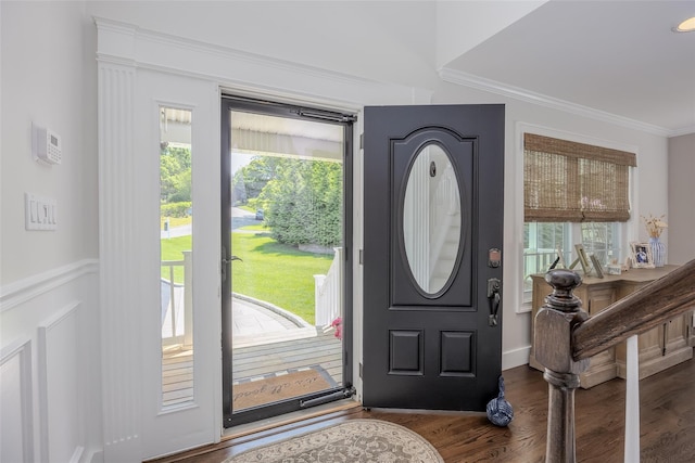 7 Long View Dr, Wading River, NY 11792 - foyer with crown molding, wood finished floors, and wainscoting