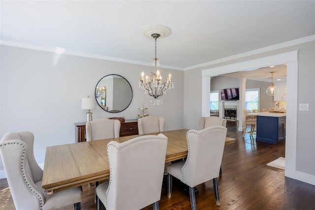 7 Long View Dr, Wading River, NY 11792 - dining area featuring a chandelier, ornamental molding, and dark wood-style floors