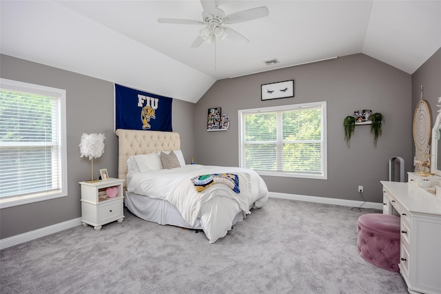 7 Long View Dr, Wading River, NY 11792 - bedroom with vaulted ceiling, light colored carpet, and a ceiling fan