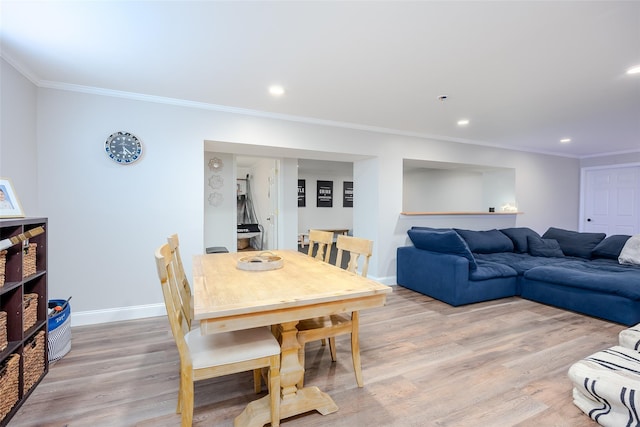 7 Long View Dr, Wading River, NY 11792 - dining area with ornamental molding, light wood-style flooring, and recessed lighting