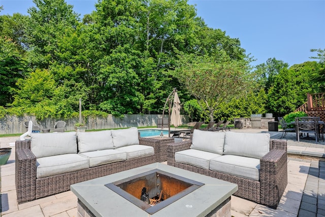 7 Long View Dr, Wading River, NY 11792 - fenced backyard with an outdoor living space with a fire pit, a patio, and outdoor dining space