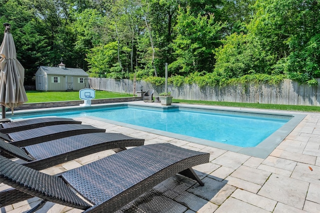 7 Long View Dr, Wading River, NY 11792 - view of pool with a fenced backyard, a patio area, and a storage unit