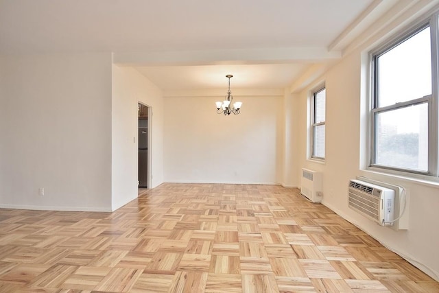 10 Lake St Unit 4E, White Plains, NY 10603 - unfurnished room with a chandelier and a wall mounted air conditioner