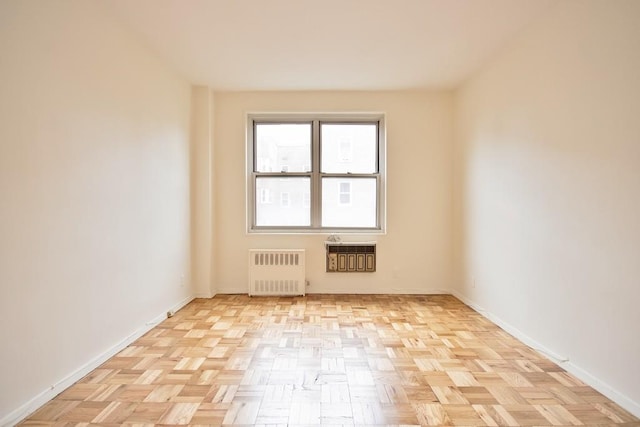 10 Lake St Unit 4E, White Plains, NY 10603 - spare room with radiator heating unit and baseboards