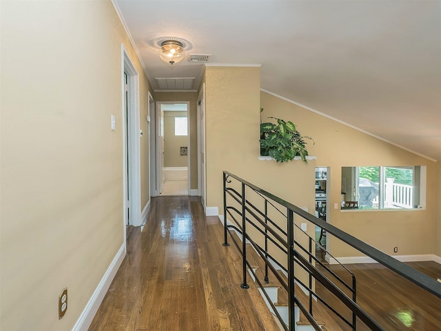 1 Barry Dr, Glen Cove, NY 11542 - corridor featuring attic access, dark wood-type flooring, and ornamental molding
