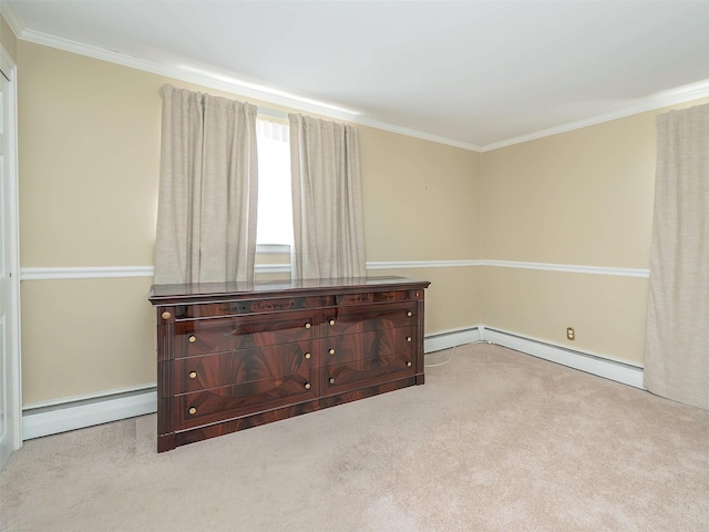 1 Barry Dr, Glen Cove, NY 11542 - unfurnished bedroom featuring baseboard heating, carpet flooring, and ornamental molding