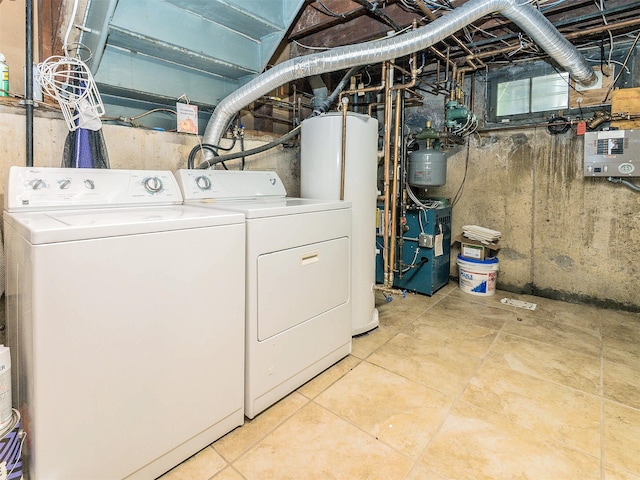 1 Barry Dr, Glen Cove, NY 11542 - laundry area with water heater, independent washer and dryer, and a heating unit