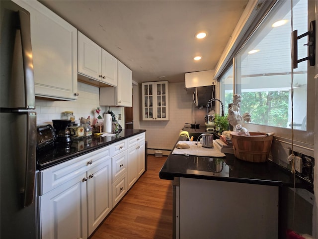 248 Pound Ridge Rd, Bedford, NY 10506 - kitchen featuring freestanding refrigerator, dark countertops, white cabinetry, wood finished floors, and recessed lighting