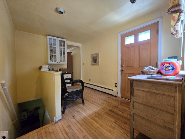 248 Pound Ridge Rd, Bedford, NY 10506 - foyer featuring a baseboard heating unit and light wood finished floors