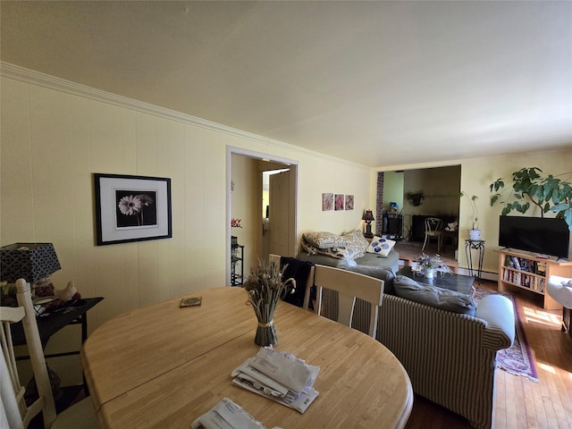 248 Pound Ridge Rd, Bedford, NY 10506 - dining area with ornamental molding, hardwood / wood-style floors, and a baseboard radiator