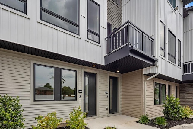 17 Union Rd Unit 108, Spring Valley, NY 10977 - doorway to property featuring a balcony and board and batten siding