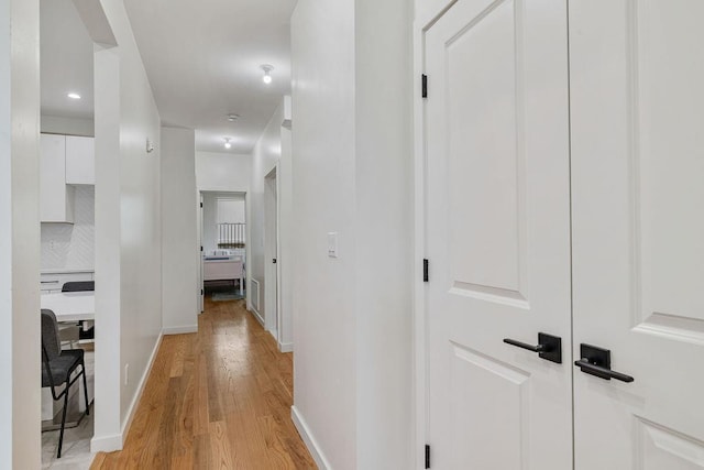 17 Union Rd Unit 108, Spring Valley, NY 10977 - hallway featuring light wood-type flooring and baseboards
