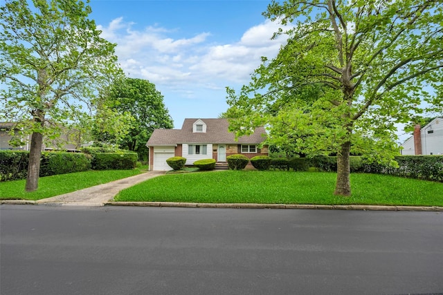 14 Byre Pl, Commack, NY 11725 - cape cod home with an attached garage, concrete driveway, and a front lawn