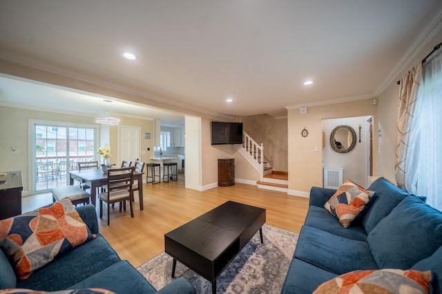 67-23 182nd St, Fresh Meadows, NY 11365 - living area featuring stairs, ornamental molding, light wood-style floors, and recessed lighting