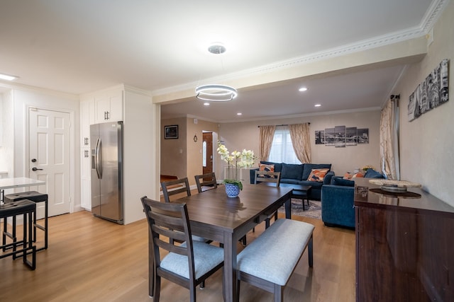 67-23 182nd St, Fresh Meadows, NY 11365 - dining space with light wood-style floors, crown molding, and recessed lighting