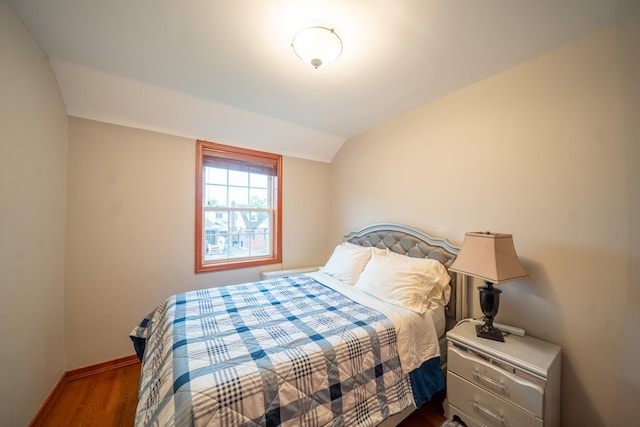 67-23 182nd St, Fresh Meadows, NY 11365 - bedroom featuring dark wood-style floors and vaulted ceiling