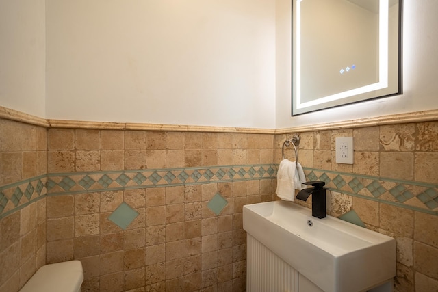 67-23 182nd St, Fresh Meadows, NY 11365 - bathroom featuring tile walls and wainscoting