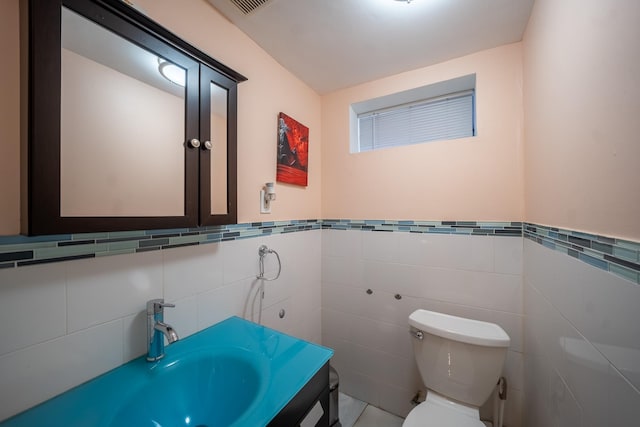67-23 182nd St, Fresh Meadows, NY 11365 - half bath featuring tile walls and vanity