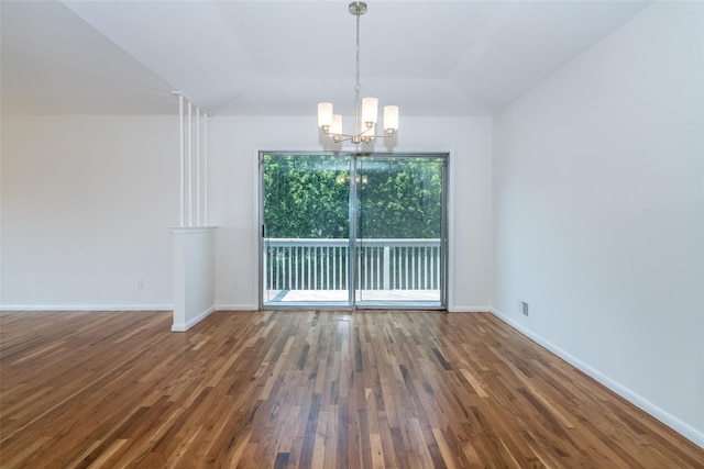 108 Kensington Oval, New Rochelle, NY 10805 - empty room featuring a chandelier, lofted ceiling, and wood finished floors