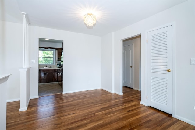 108 Kensington Oval, New Rochelle, NY 10805 - spare room featuring wood finished floors and a chandelier