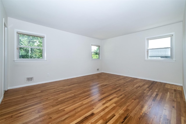 108 Kensington Oval, New Rochelle, NY 10805 - unfurnished room with wood finished floors and baseboards