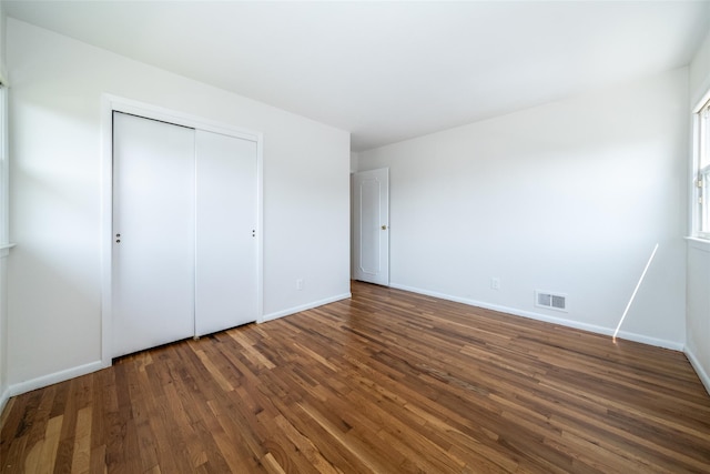 108 Kensington Oval, New Rochelle, NY 10805 - unfurnished bedroom featuring wood finished floors and a closet