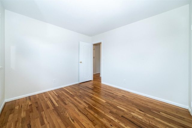108 Kensington Oval, New Rochelle, NY 10805 - spare room featuring baseboards and wood finished floors