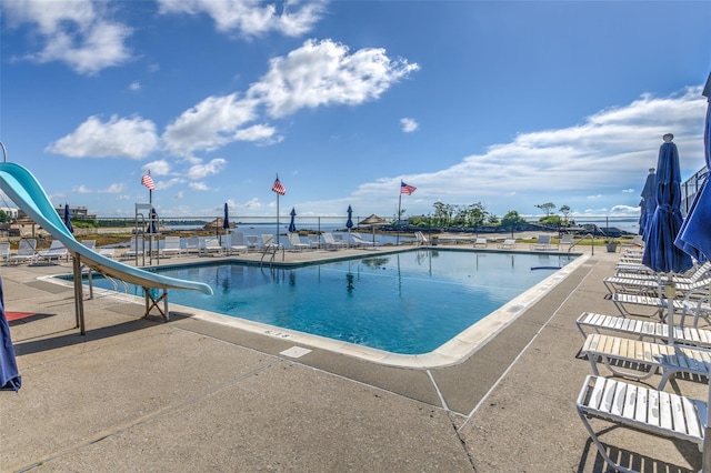 108 Kensington Oval, New Rochelle, NY 10805 - community pool featuring a water slide and a patio