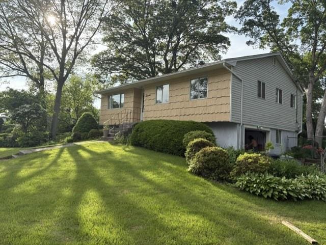 11 Hart St, Port Jefferson Station, NY 11776 - view of property exterior with a yard