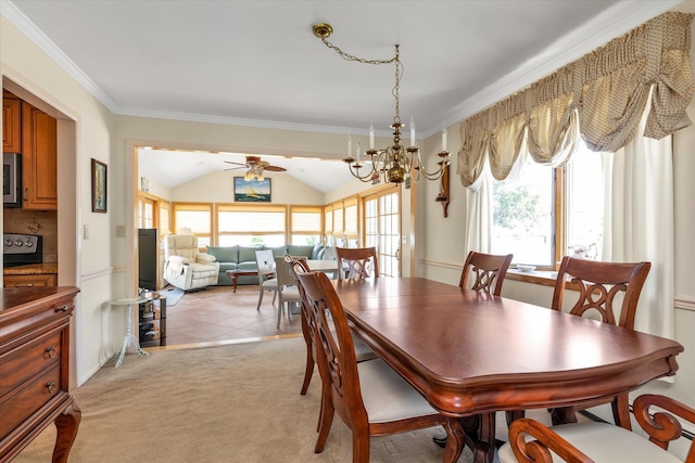 1182 Adrienne Ln, Seaford, NY 11783 - dining area with lofted ceiling, a ceiling fan, ornamental molding, light colored carpet, and a chandelier