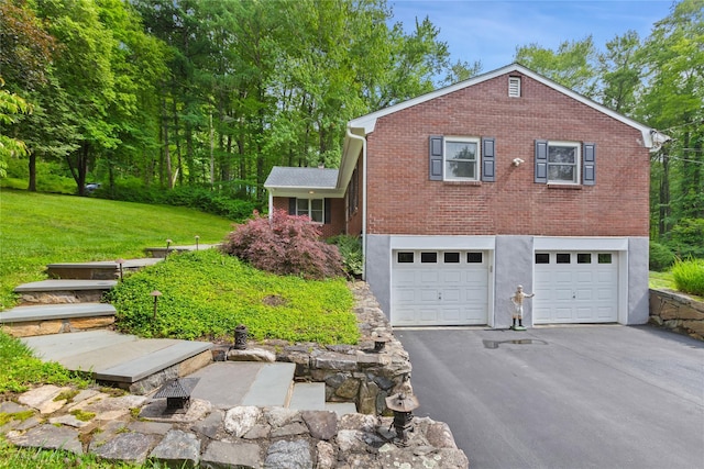 1 Hawthorne Ct, North Salem, NY 10560 - view of front facade with driveway, brick siding, a garage, and a front lawn