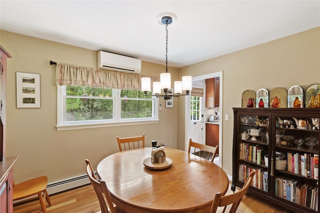 1 Hawthorne Ct, North Salem, NY 10560 - dining room with a wall mounted air conditioner, baseboard heating, a chandelier, and light wood-style floors