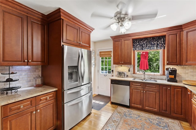 1 Hawthorne Ct, North Salem, NY 10560 - kitchen with appliances with stainless steel finishes, ceiling fan, backsplash, and light wood-type flooring