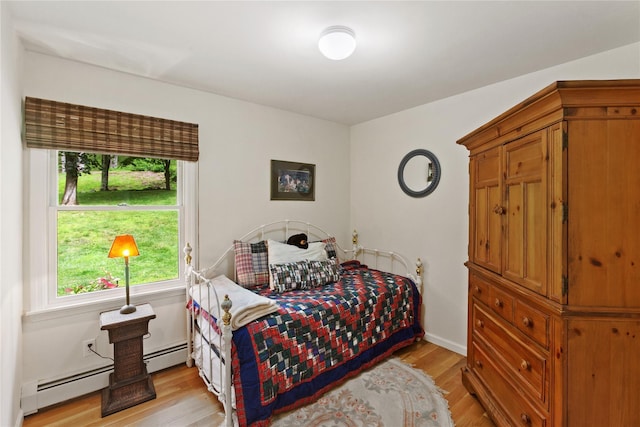 1 Hawthorne Ct, North Salem, NY 10560 - bedroom featuring a baseboard radiator and light wood-type flooring