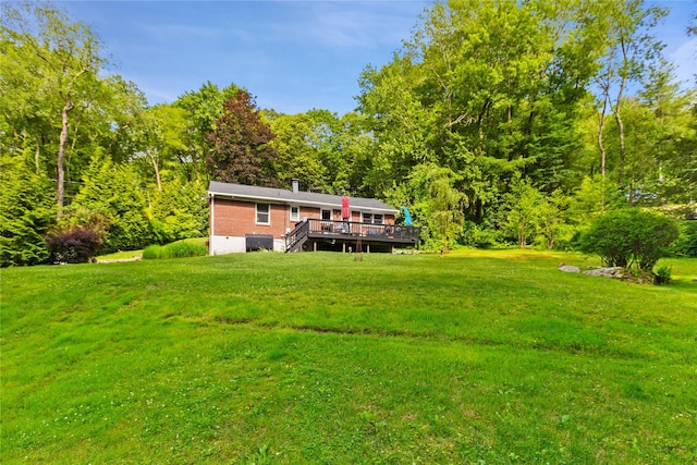 1 Hawthorne Ct, North Salem, NY 10560 - view of grassy yard featuring a deck and a wooded view