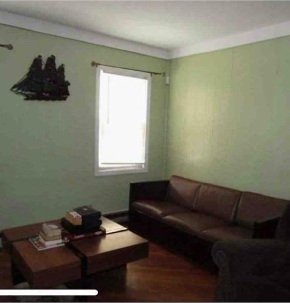 135-15 243rd St, Rosedale, NY 11422 - living area featuring wood finished floors