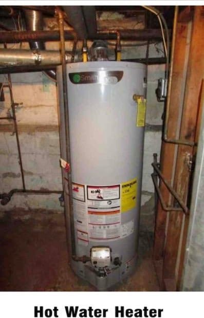 135-15 243rd St, Rosedale, NY 11422 - utility room featuring water heater
