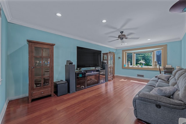 72 Harris Ave, Hewlett, NY 11557 - living room with wood finished floors, a ceiling fan, ornamental molding, and recessed lighting