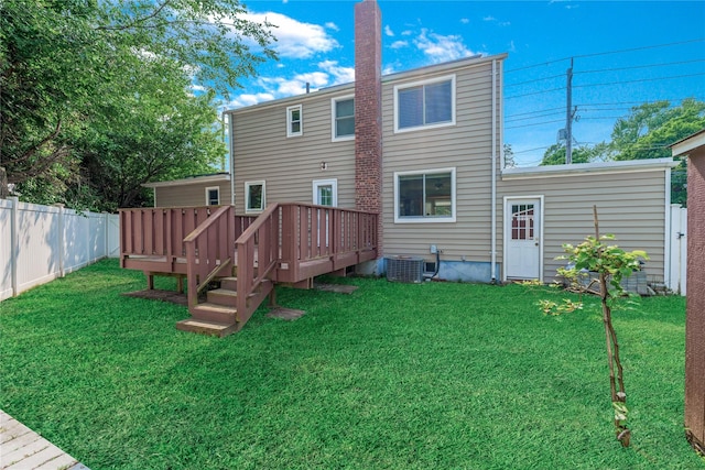 72 Harris Ave, Hewlett, NY 11557 - rear view of house featuring a wooden deck and a fenced backyard