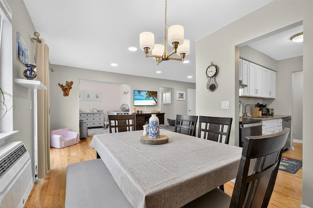 129 Main St Unit D12, Cornwall, NY 12518 - dining space featuring a chandelier, light wood-type flooring, recessed lighting, and heating unit