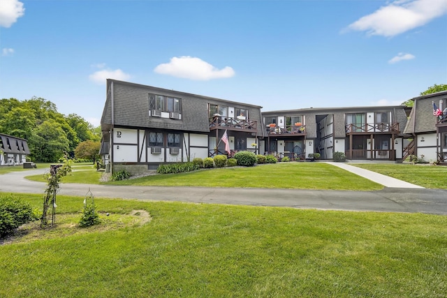 129 Main St Unit D12, Cornwall, NY 12518 - view of front of property featuring a front yard and roof with shingles