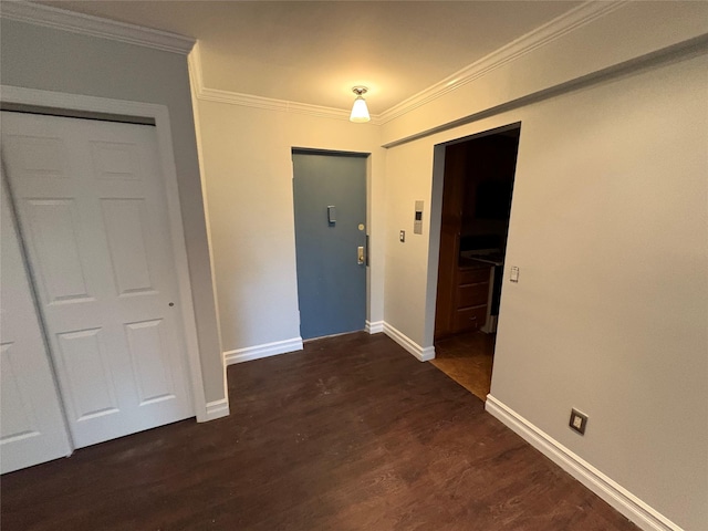 596 Broadway Unit 10A, Lynbrook, NY 11563 - entrance foyer with ornamental molding and dark wood-style floors