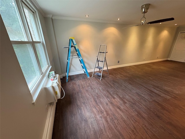 596 Broadway Unit 10A, Lynbrook, NY 11563 - exercise room featuring crown molding, dark wood-style flooring, and ceiling fan