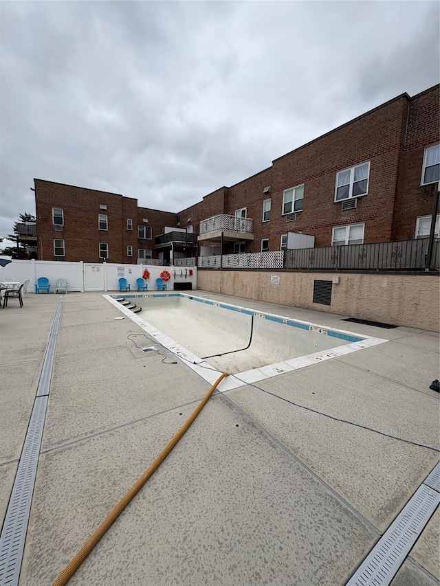 596 Broadway Unit 10A, Lynbrook, NY 11563 - community pool with a patio area