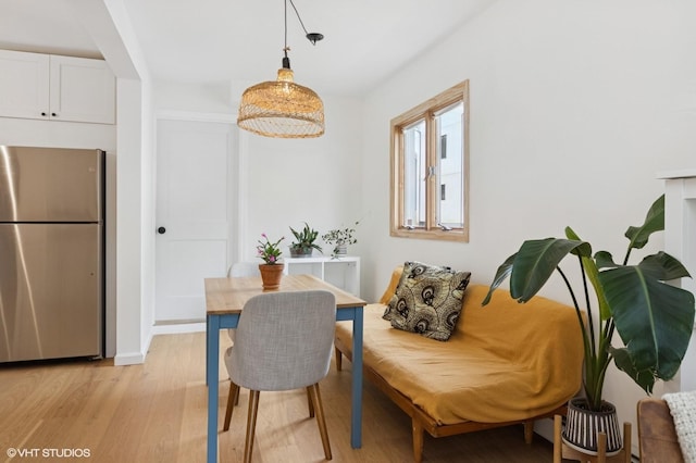 50 N Chestnut St, Beacon, NY 12508 - dining room with light wood finished floors and radiator