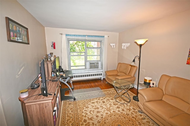 221 Middle Neck Rd Unit I-3, Great Neck, NY 11021 - living area with radiator heating unit, wood finished floors, and cooling unit