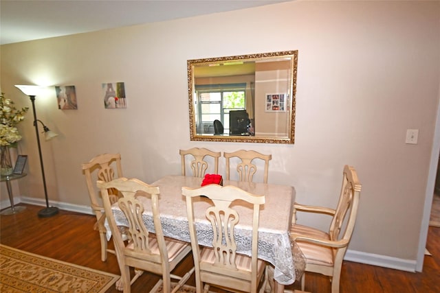 221 Middle Neck Rd Unit I-3, Great Neck, NY 11021 - dining area featuring baseboards and wood finished floors