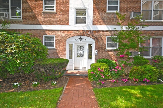 221 Middle Neck Rd Unit I-3, Great Neck, NY 11021 - doorway to property with brick siding