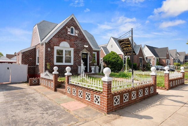 131-36 Francis Lewis Blvd, Laurelton, NY 11413 - tudor house with brick siding